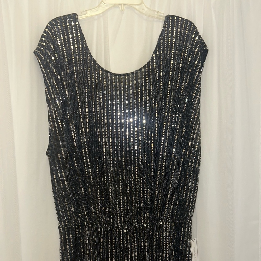 PERFECT for a night out! Gorgeous black and silver jumpsuit. Size 16